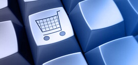 Teclado de computador com tecla com desenho de carrinhos de compras